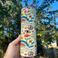 Cute retro 70s look tumbler with rainbows, mushrooms, floral stars, peace signs 20oz skinny or 12oz kids bottle